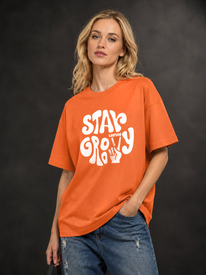 Leotude Orange Stay Groovy Printed Oversized Tshirt for Women